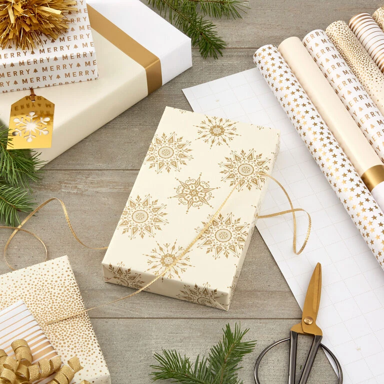 Hallmark Gold And White 6-Pack Holiday Wrapping Paper Assortment, 180 Sq. Ft. 4 Hallmark Gold And White 6-Pack Holiday Wrapping Paper Assortment, 180 Sq. Ft. - Image 2
