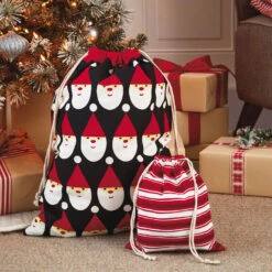 Hallmark 10" And 20" Santa And Stripes 2-Pack Fabric Christmas Gift Bags 9 Hallmark 10" And 20" Santa And Stripes 2-Pack Fabric Christmas Gift Bags -Hallmark Sales Store Santa and Stripes Medium and XL Fabric Gift Bags XGB4902 02