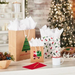 Hallmark Merry Mix 8-Pack Christmas Gift Bags, Assorted Sizes And Designs 9 Hallmark Merry Mix 8-Pack Christmas Gift Bags, Assorted Sizes And Designs -Hallmark Sales Store White and Kraft Paper Assortment Christmas Gift Bags 5XGB1410 02